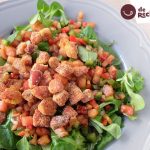 Ensalada de canónigos con jamón al curry