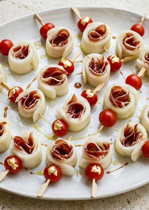 Ensalada de melón con jamón y tomates cherry a los dos oros