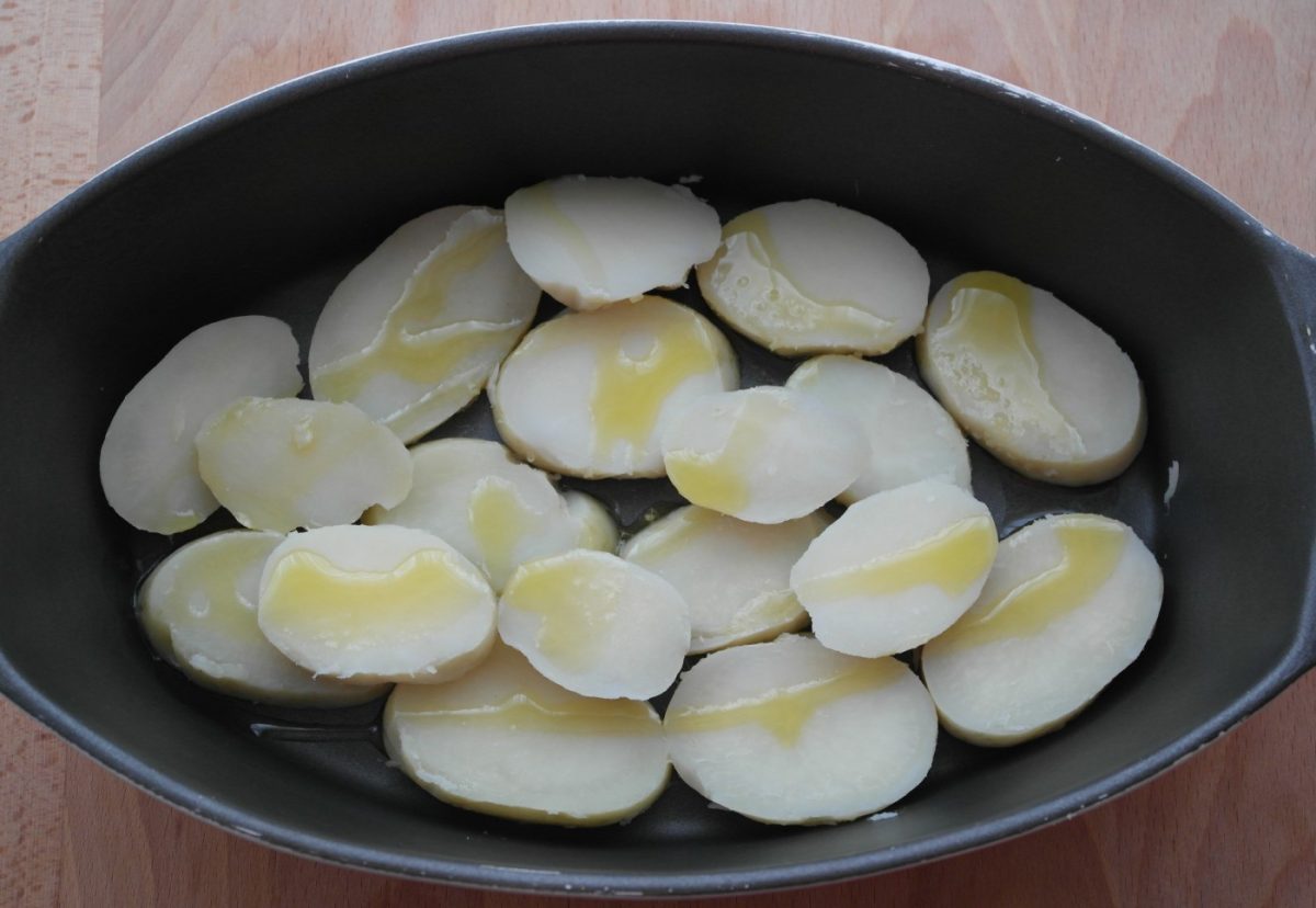 Bacalao al horno con pan de maíz. Bacalhau com broa