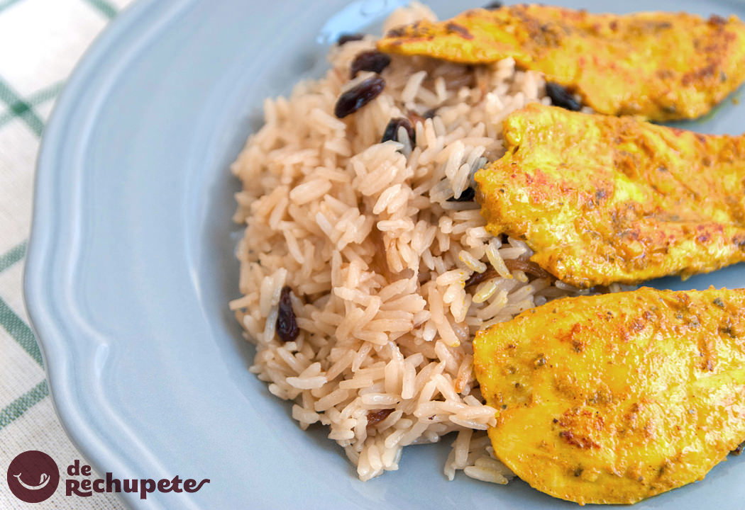 Escalopines de pollo con arroz oriental