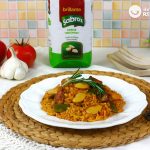 Arroz con pollo y conejo en paella