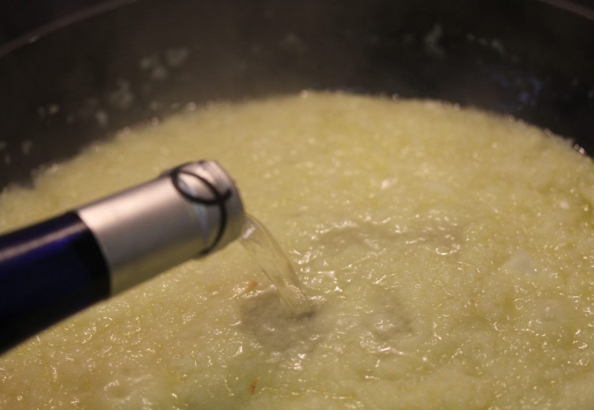 Centolla o centollo gratinado con langostinos y lacón