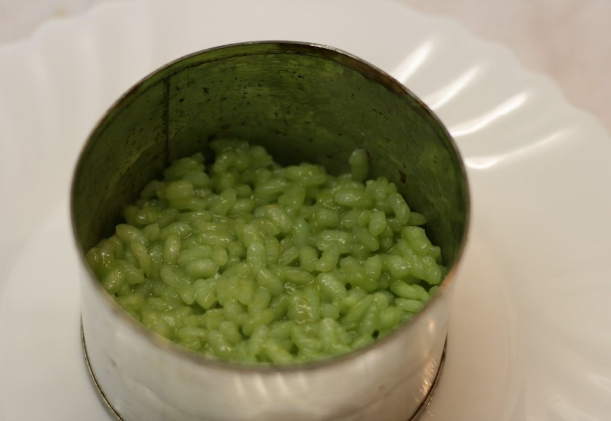 Lubina al horno con arroz de guisantes