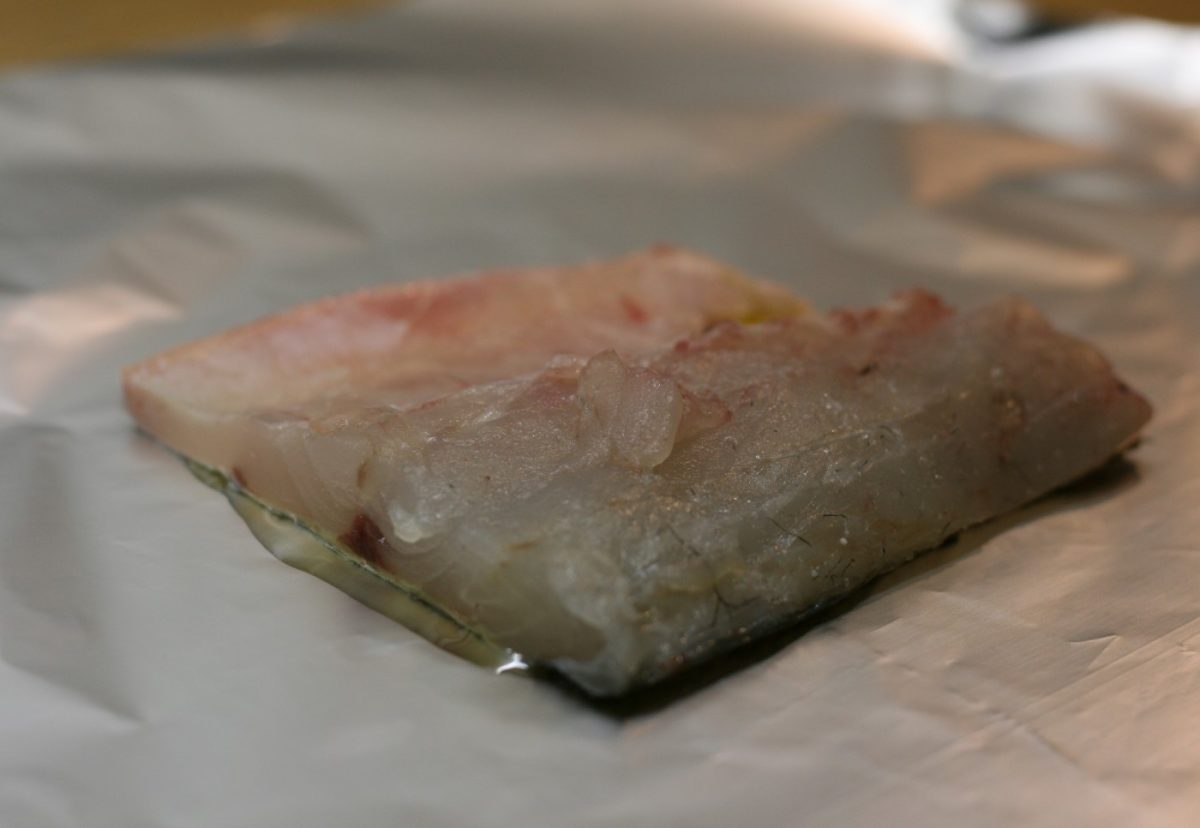 Lubina al horno con arroz de guisantes