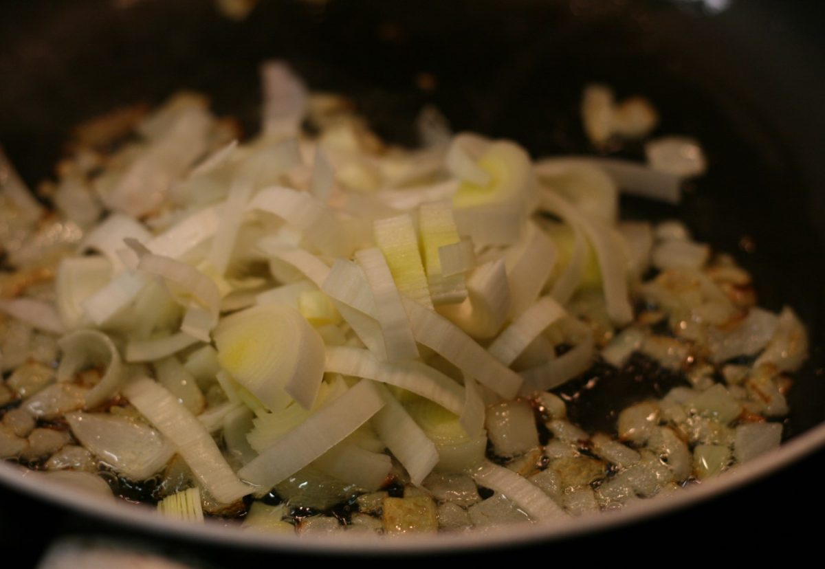 Lubina al horno con arroz de guisantes
