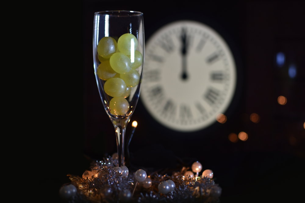 12 uvas y reloj de Nochevieja