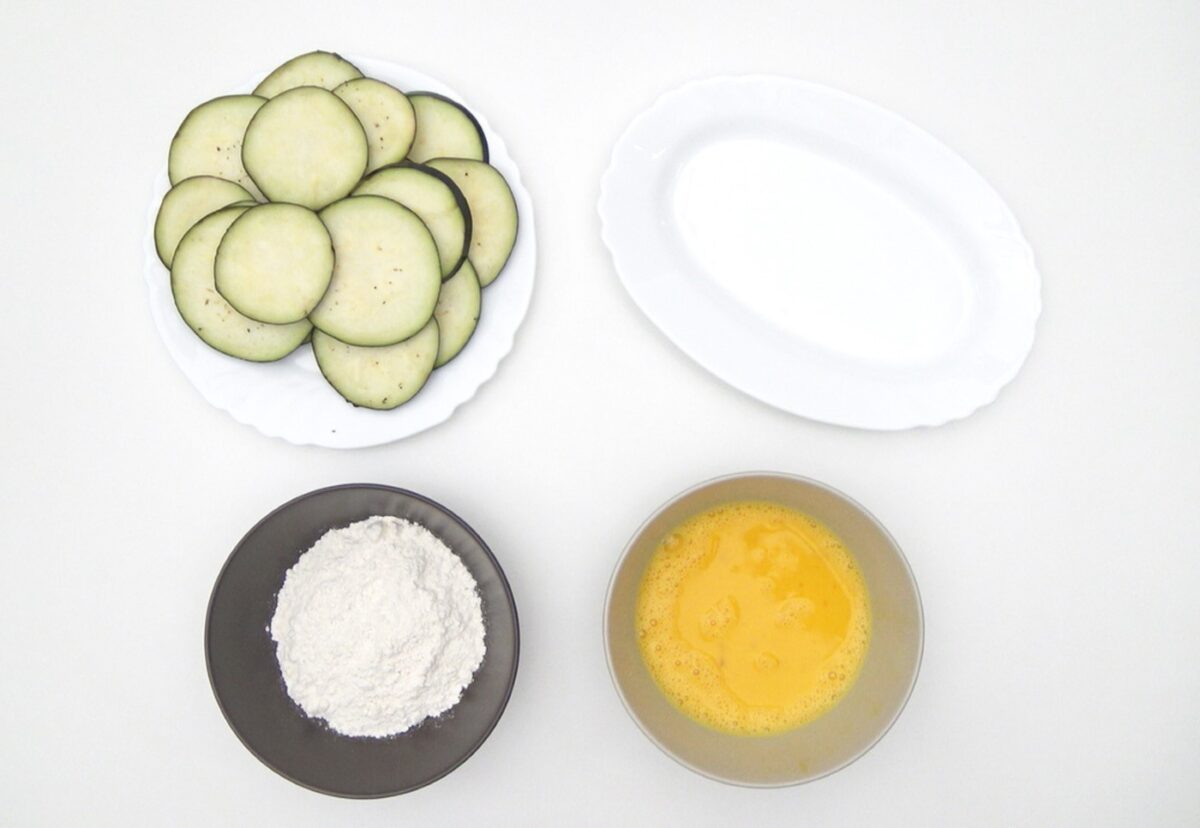 Cómo hacer berenjenas rebozadas perfectas. Receta de berenjenas crujientes y fritas