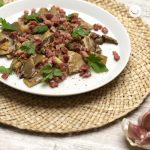 Setas al ajillo con jamón. Receta fácil paso a paso