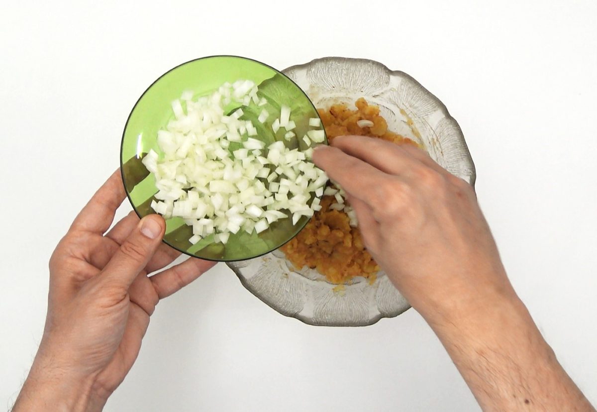 Rin ran de bacalao. Receta tradicional con pimientos y patata
