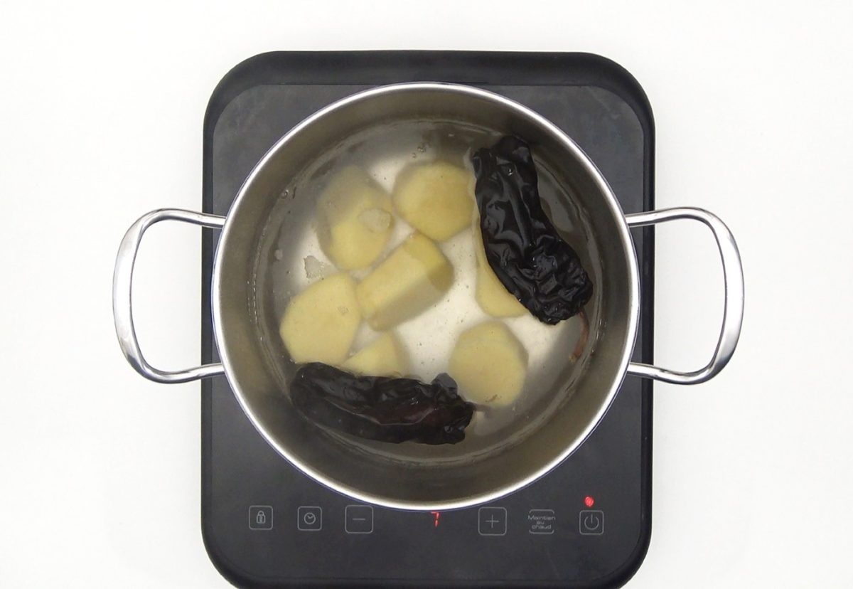 Rin ran de bacalao. Receta tradicional con pimientos y patata