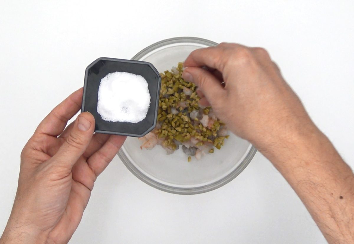Merluza rellena de marisco gratinada con mayonesa