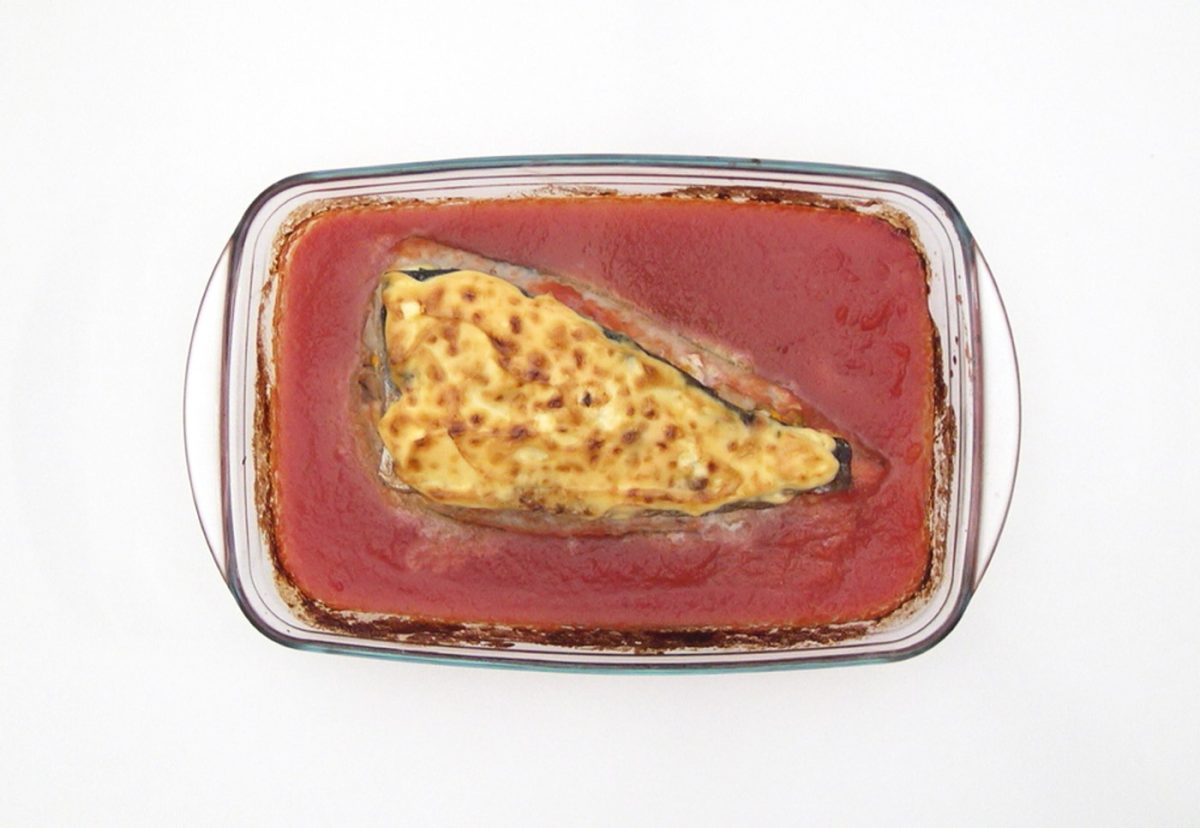 Merluza rellena de marisco gratinada con mayonesa