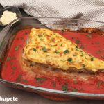 Merluza rellena de marisco gratinada con mayonesa