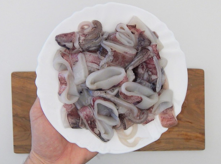 Calamares en su tinta con arroz blanco
