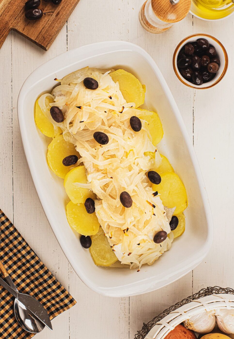 Bacalao a la portuguesa al horno. Receta al estilo Margarida da praça