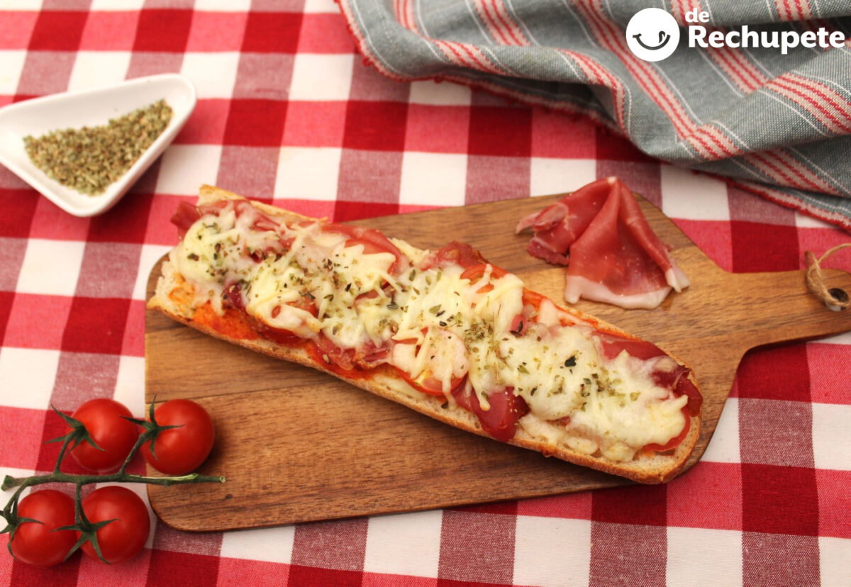 Pan pizza de jamón con queso mozzarella y tomatitos cherry