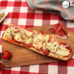 Pan pizza de jamón con queso mozzarella y tomatitos cherry