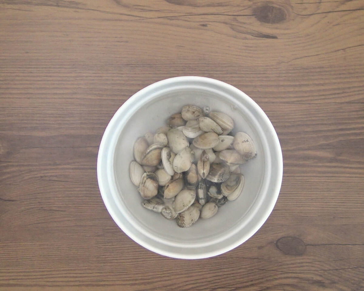 spaghetti nero di seppia al frutti di mare paso 6