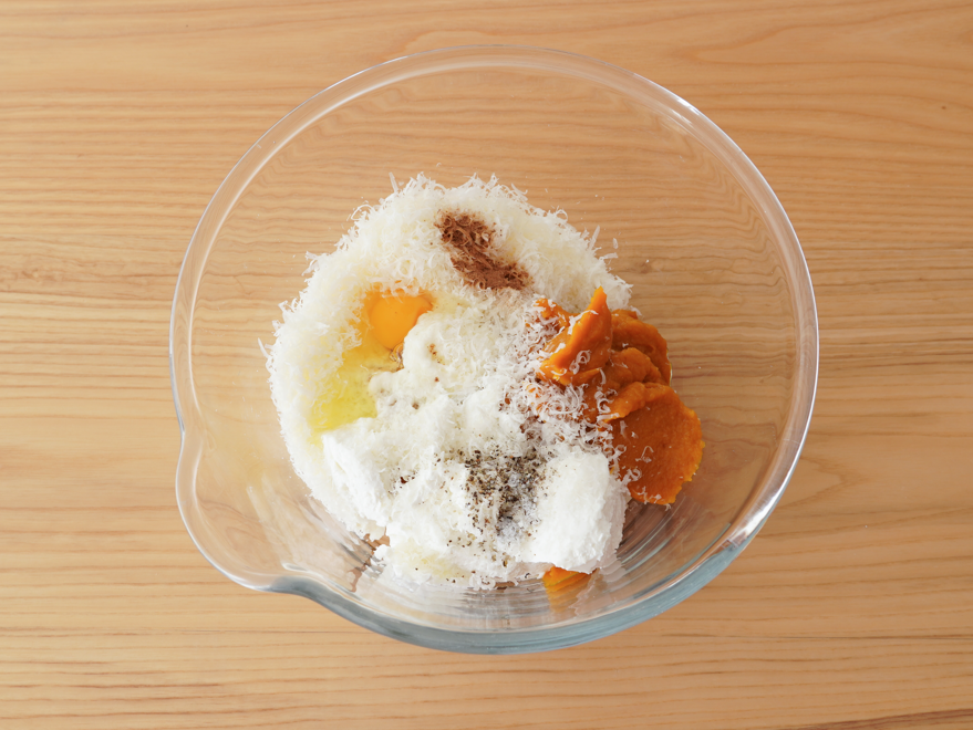 Ñoquis de calabaza con queso ricotta, parmesano y rúcula