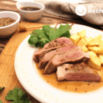 Secreto ibérico con salsa de cerveza y miel