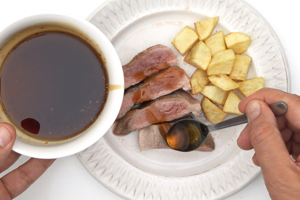 Secreto ibérico con salsa de cerveza y miel