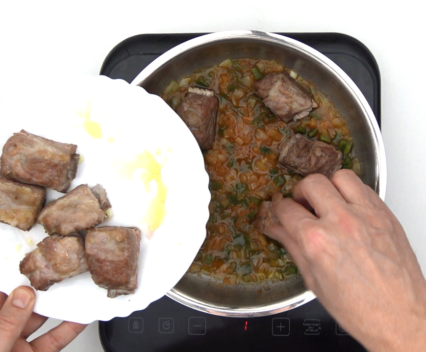 Arroz caldoso con costillas de cerdo. Receta tradicional paso a paso