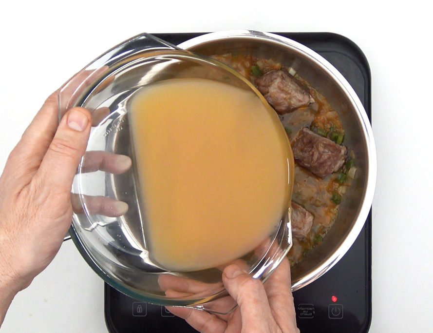 Arroz caldoso con costillas de cerdo. Receta tradicional paso a paso