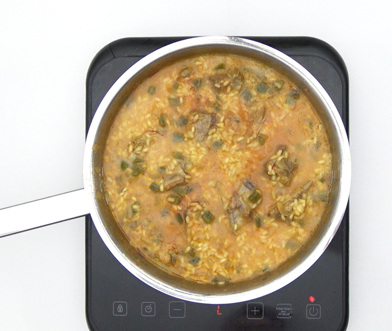 Arroz caldoso con costillas de cerdo. Receta tradicional paso a paso