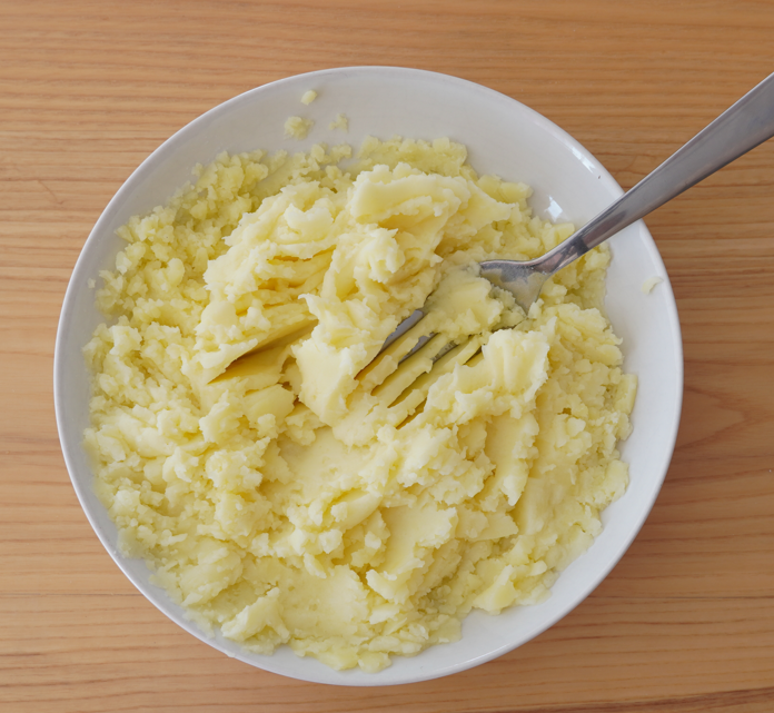 Carré de cordero con puré de patata