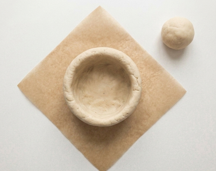 Panades mallorquinas de cordero y guisantes, cómo formarlas y hornearlas bien