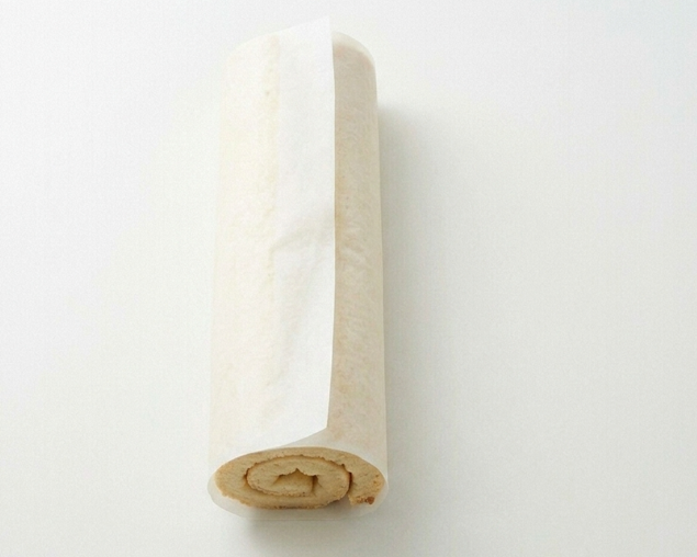 Phoskitos caseros, el pastelito enrollado con crema y cobertura de chocolate