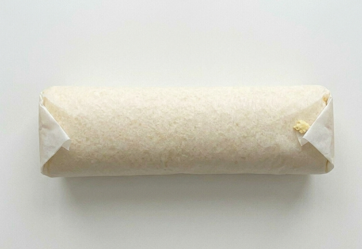 Phoskitos caseros, el pastelito enrollado con crema y cobertura de chocolate