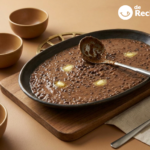 Dal Bukhara: urad negro cocinado a fuego lento con tomate, mantequilla y nata