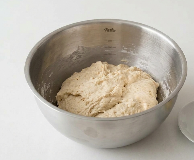 Xuxos de crema. Masa hojaldrada, frita y rellena de crema pastelera